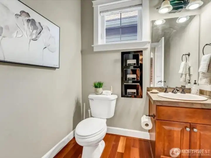 Half Bath on Main. virtually staged.