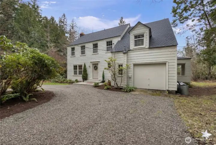 Front view of home with new roof to be installed prior to closing.