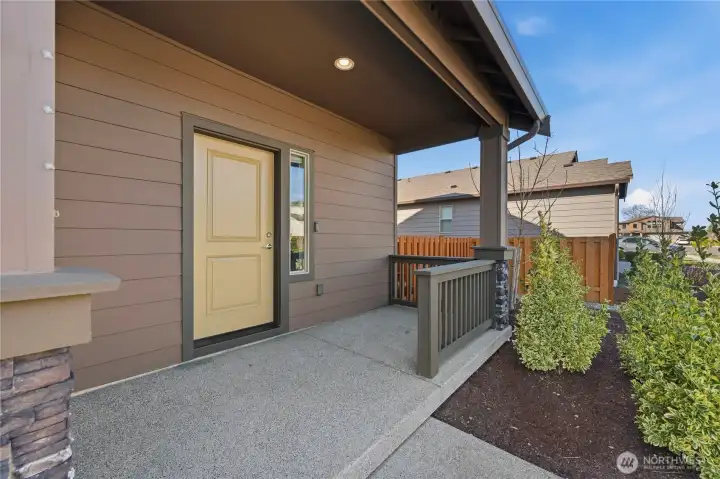 Covered front porch offering a warm and welcoming first impression.