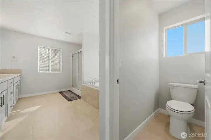 Private en-suite bath designed with comfort in mind.