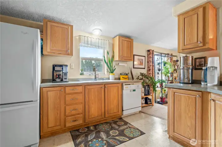 The kitchen has plenty of storage and counter space.