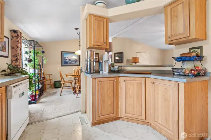 the center island with the breakfast bar on the other side.