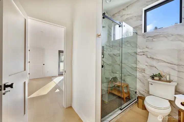 Upper level bathroom with walk in shower.