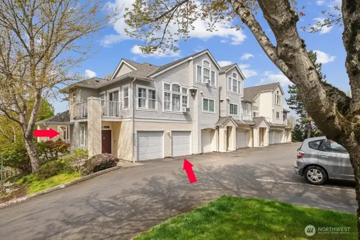No stairs to front door, and a direct-access attached garage