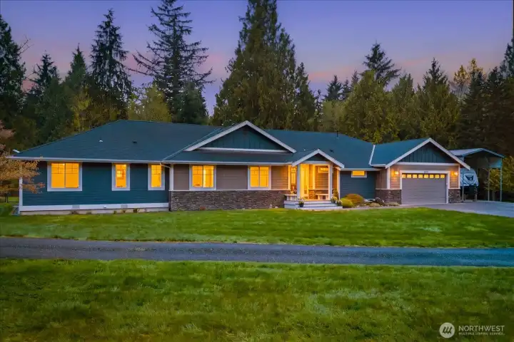 Sprawling custom built rambler on 5.98 acres. RV parking off to the right.
