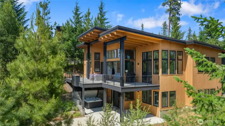 Side view of home, nestled in the trees