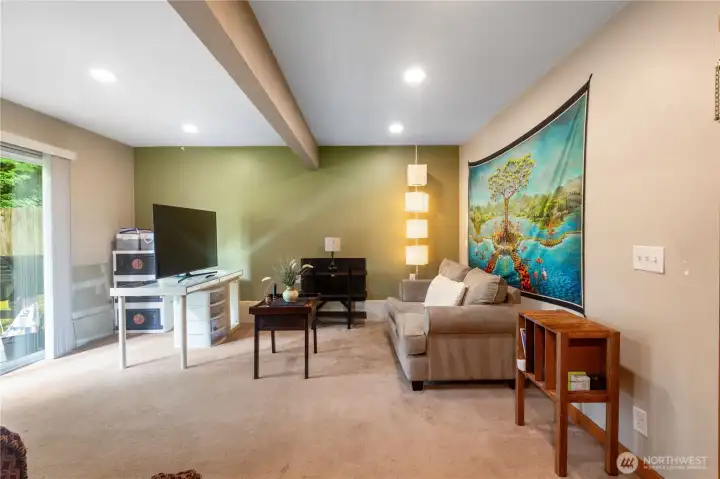 Conveniently located just off the garage, this versatile living area provides easy everyday access while maintaining separation from the main living spaces.