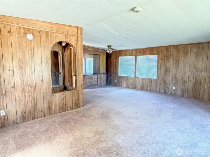 Walking in the front door to the livingroom and the corner to the full size dining room.