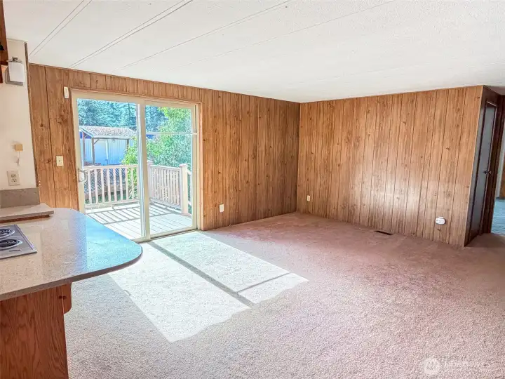 Check out this family room! Huge space, kitchen to the left