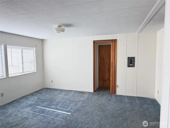 Check out this Primary Suite. That door leads to.....