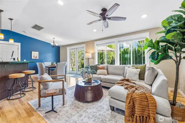 Open concept floor plan with wood floors and a lot of light. Open concept floor plan with wood floors and a lot of light.