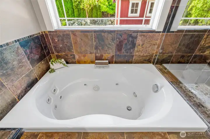 Check out this amazing jetted tub surrounded by beautiful flagstone! Check out this amazing jetted tub surrounded by beautiful flagstone!