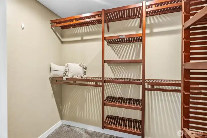 High-end built-in shelving in the walk-in closet. High-end built-in shelving in the walk-in closet.