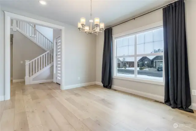 Spacious living room could easily serve as a formal dining room as well.