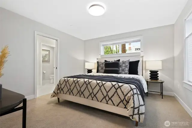 Lower floor guest suite with full bath is ideal for out of town guests!