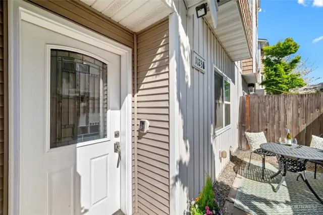 Front door off fully fenced patio
