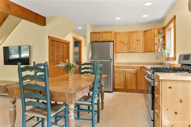 Warm and inviting kitchen with solid pine cabinetry and natural wood finishes