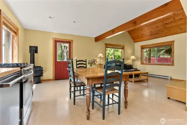 Wood trim and finishes reflect the home’s natural cabin aesthetic