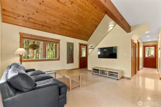 Wood laminate flooring throughout for a warm, rustic feel