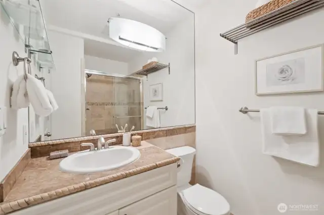 Attractive finishes in this 3/4 bath on lower level