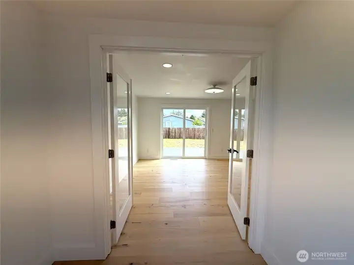LOOKING INTO TO 3 MAIN FLOOR BEDROOM