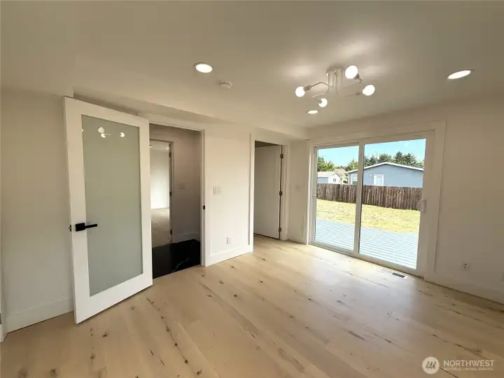 4TH BEDROOM ON MAIN FLOOR WITH SLIDER DOOR