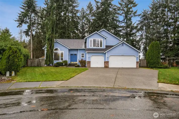 Front of house from cul-de-sac. Long driveway for plenty of off street parking. Sidewalks throughout the neighborhood.