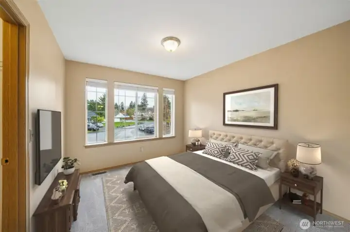 2nd bedroom on upper level has a walk-in closet too!  (virtually staged)