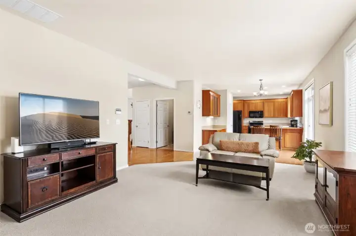 Open concept family room centrally located just off the kitchen and backyard sliding door for easy entertaining.