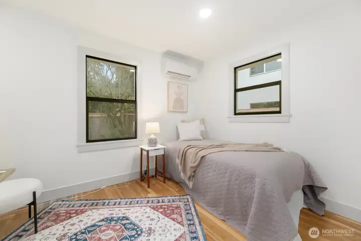 Main floor 2nd bedroom situated with mini-split heating and cooling.