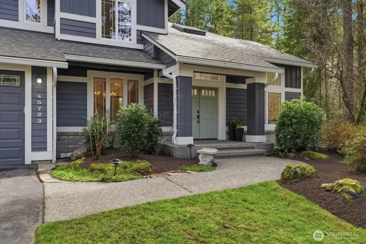 Recent exterior updates include a newer roof (5 years old), LeafGuard gutter system, and fresh exterior paint.