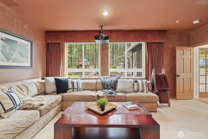 Expansive theater room, fully equipped with everything needed for a cinematic experience.