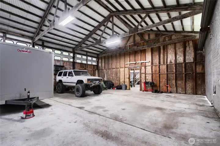 Detached outbuilding with durable construction, perfect for storage, workshop use, or hobby space. Conveniently located on the property with easy access from the main home.