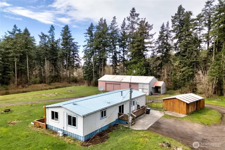 Exterior showcasing outbuildings and expansive property