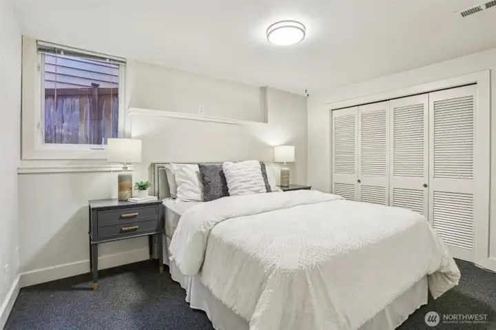 Downstairs, a third bedroom and bathroom are also a part of the main living area, separate from the ADU.