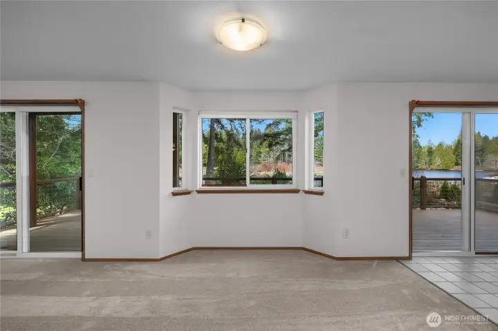 New carpet throughout. Bay windows and 2 sliding doors to go lakeside!