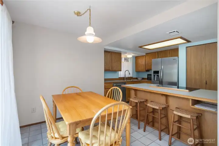 Dining room with lots of light.