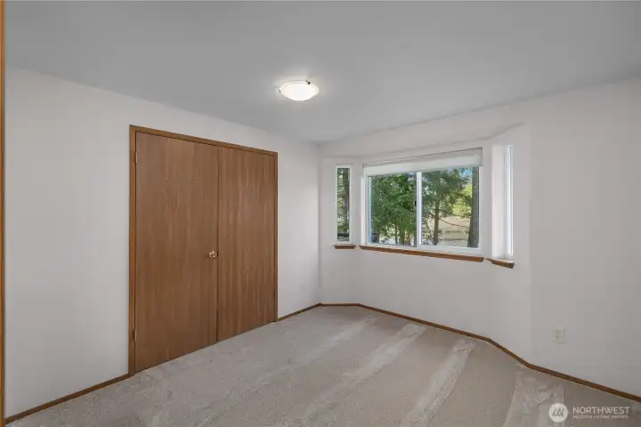 Bedroom 3 or bonus room, looks lakeside.