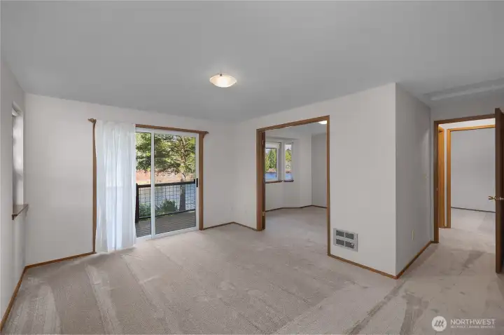 Primary ensuite with private balcony - enjoy your nights watching the sun set on the lake!