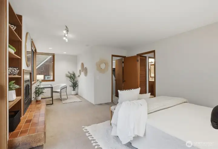 Primary bedroom with walk-in closet, private nook and deck.