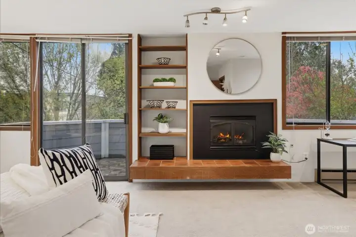 Primary bedroom includes natural gas fireplace.