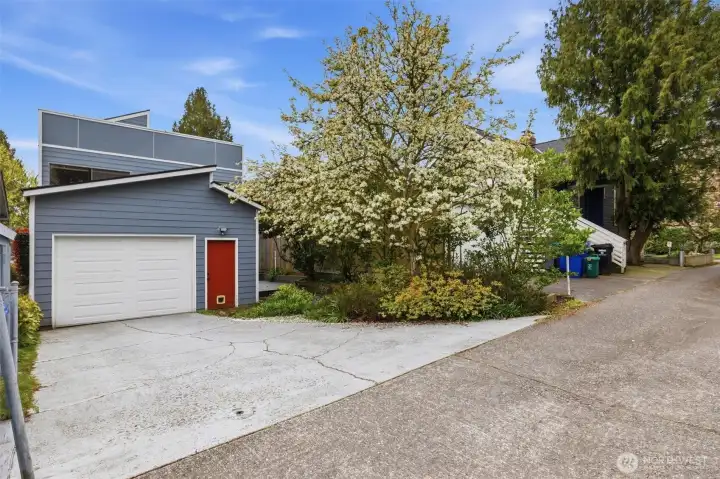 Alley access with attached 1-car garage.