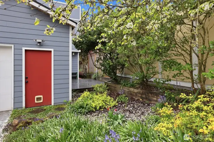 Man-door off attached garage.