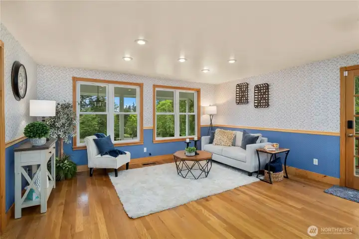 Dining area staged as an additional living area.