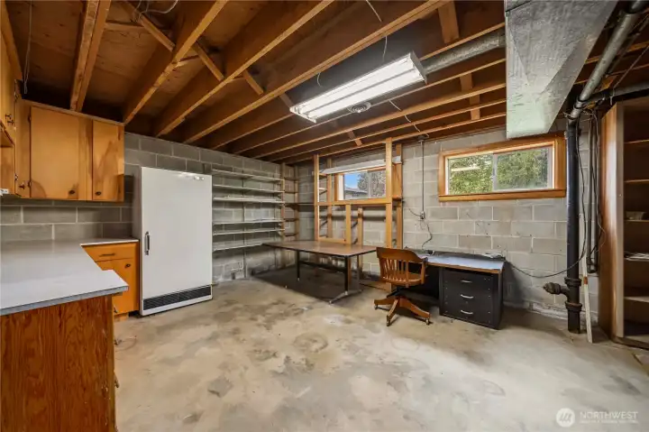 Additional storage space + space for hobbies on the lower level.