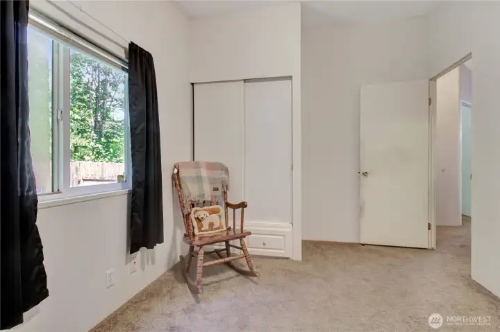 Second bedroom closet space and entry.
