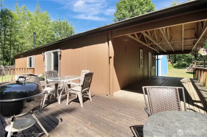 Wrap around porch! A great feature for entertaining guests, barbequing, sunbathing, and pets!