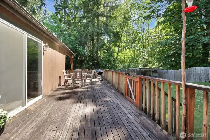 Full length porch right off the Primary bedroom with plenty of room for seating!