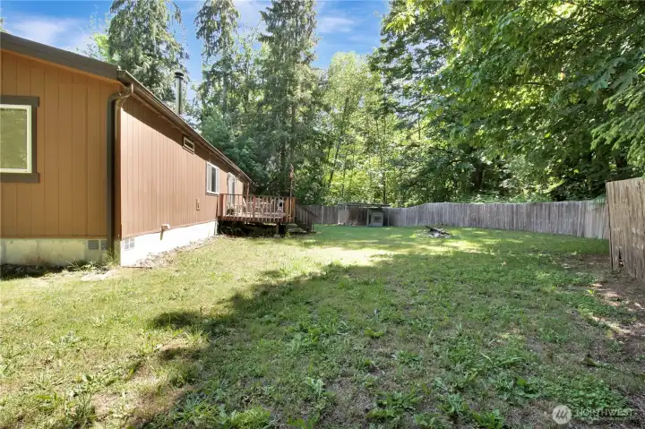 Septic is located close to this area in the back of the house. Septic tank is also to the left here. Easy access, but out of the way!