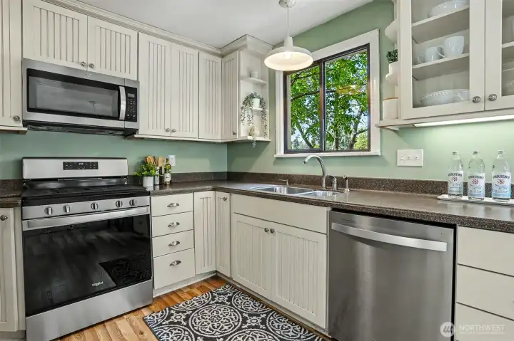 The kitchen has lots of counter and cabinet space.
